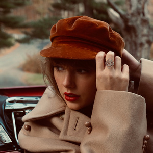 Taylor Swift Red era portrait in vintage car with velvet newsboy cap and red lipstick